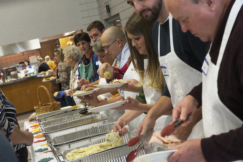 Tradition of racing, serving meals part of Thanksgiving for many